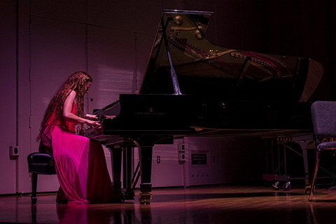 Solo pianist performs live on stage